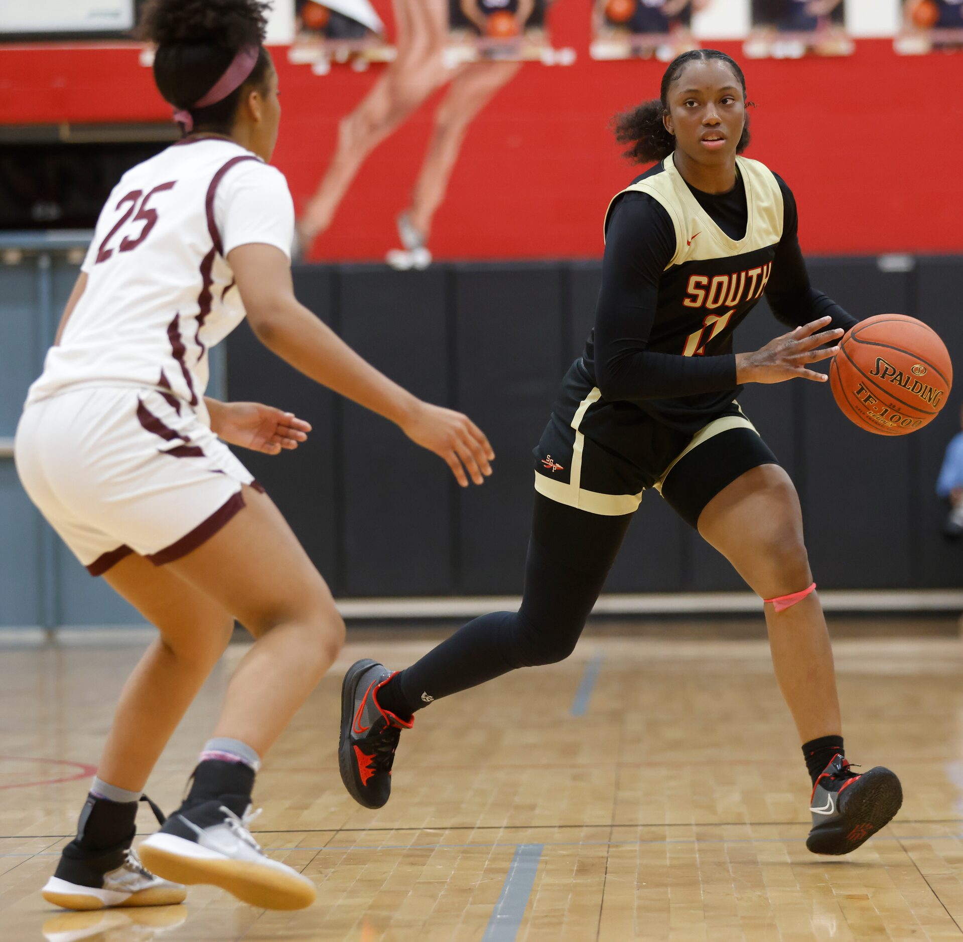 Plano Senior High School Salese Blow (25) defends South Grand Prairie High School Jahcelyn...