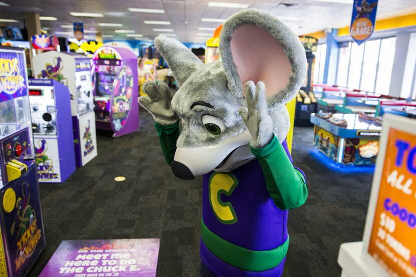 Chuck E Cheese dances with children at Chuck E Cheese on Wednesday, April 8, 2015 in Irving,...