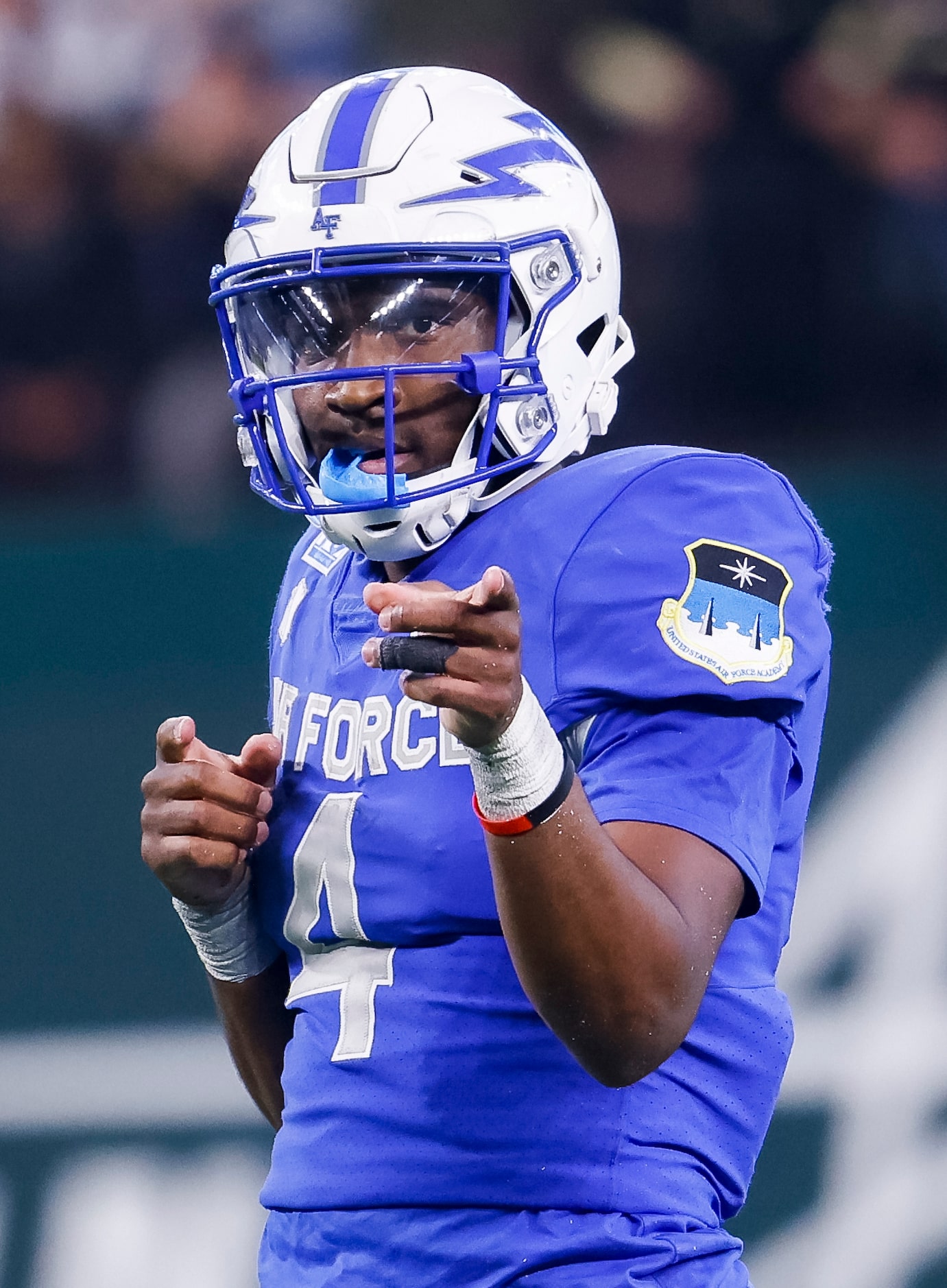 Air Force Falcons quarterback Haaziq Daniels (4) celebrates a run against the Army Black...