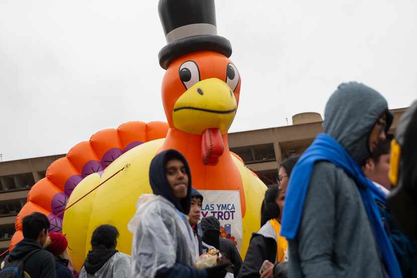 An inflatable turkey towered over the scene at last year’s YMCA Turkey Trot in downtown...