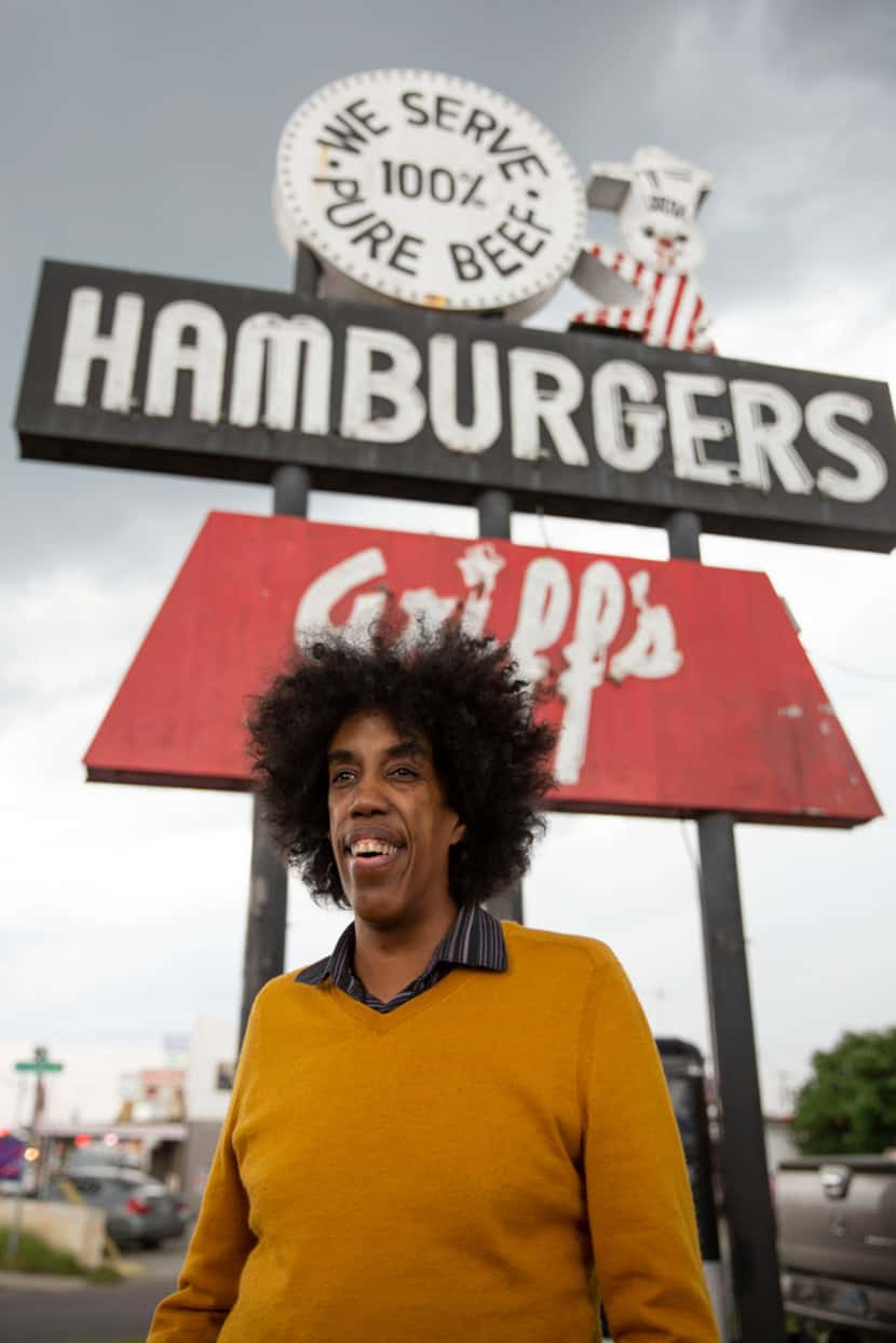 Playwright Jonathan Norton stands in front of Griff's Hamburgers in the Pleasant Grove area...