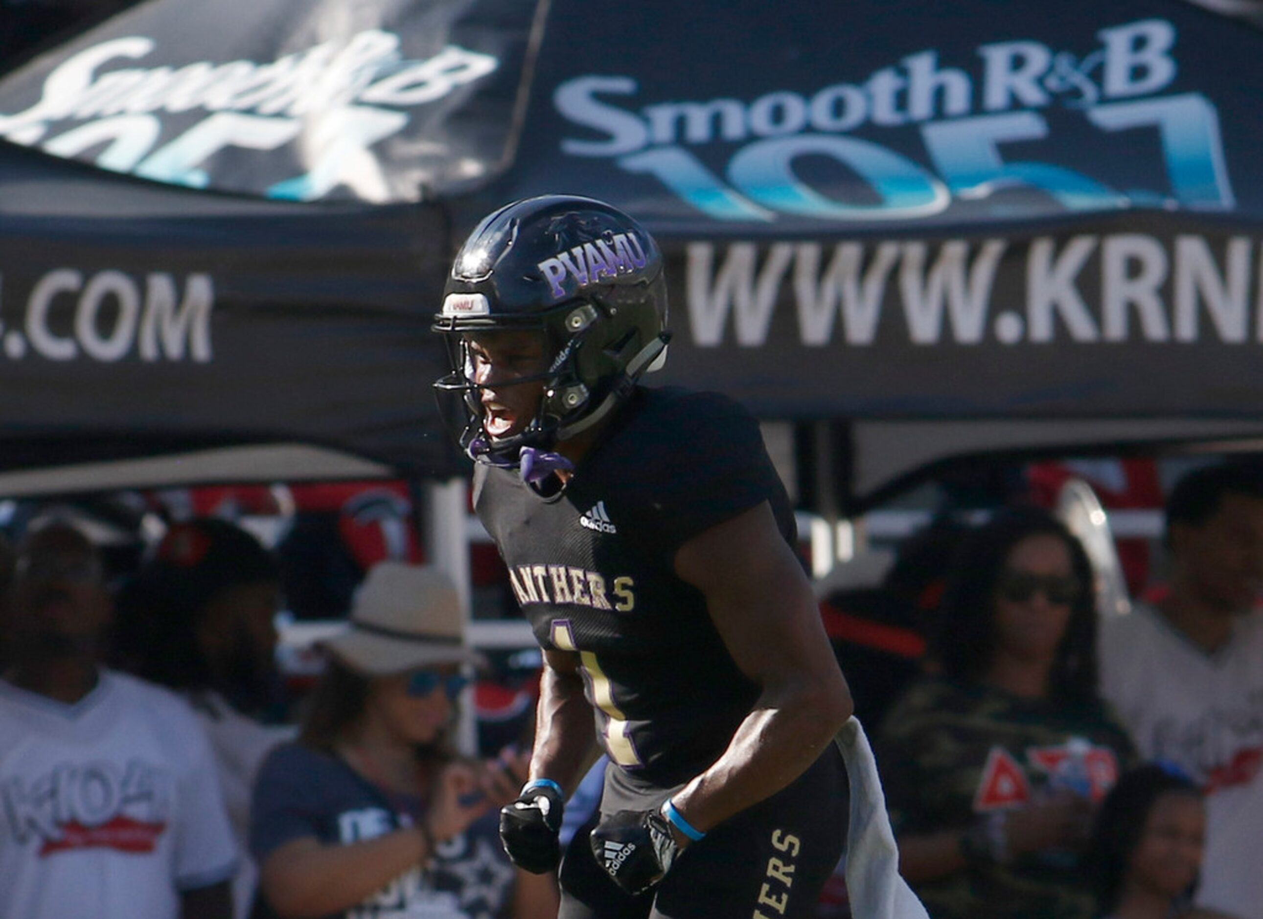 Prairie View running back Dawonya Tucker (1) lets out a yell after scoring a rushing...