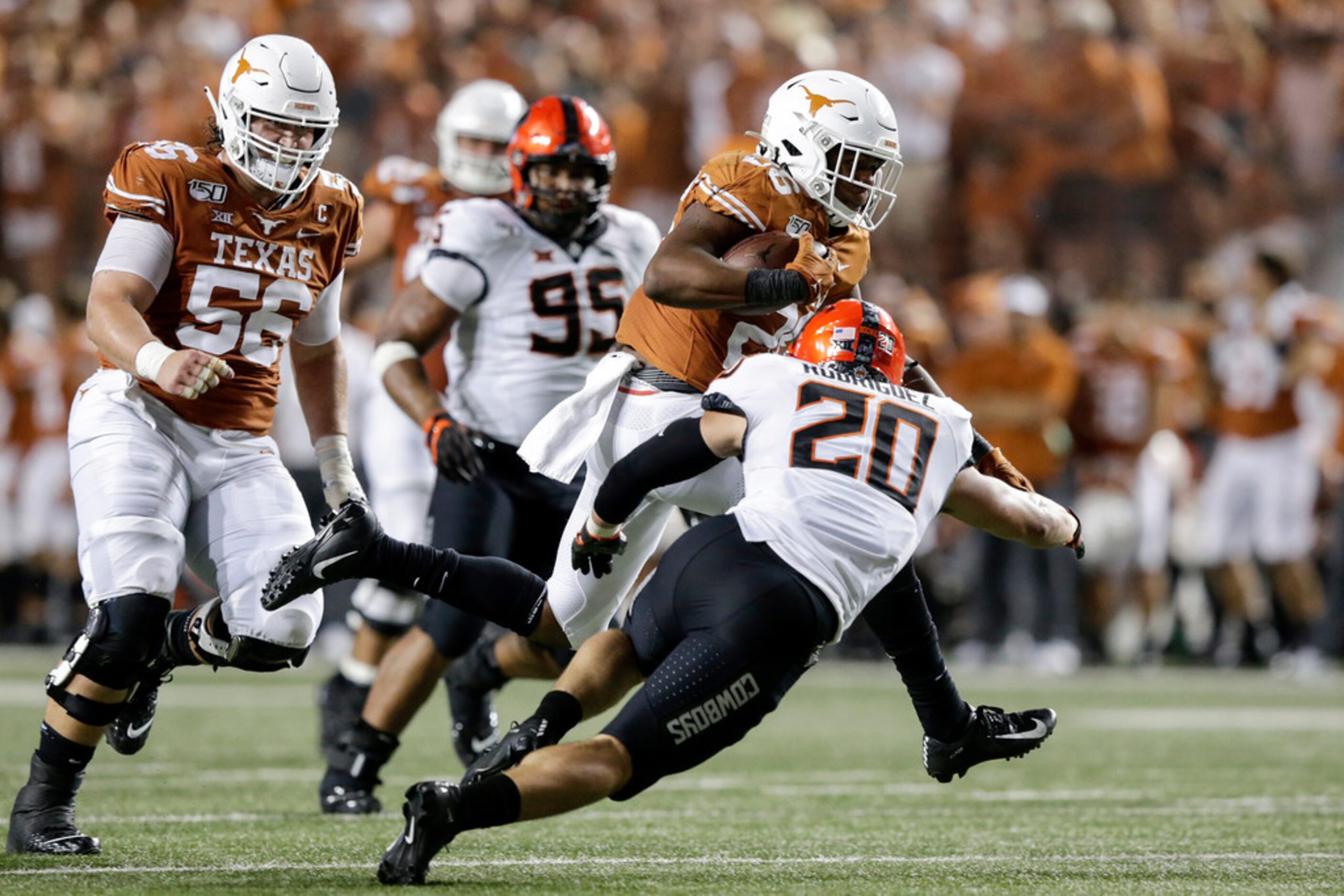 AUSTIN, TX - SEPTEMBER 21:  Keaontay Ingram #26 of the Texas Longhorns runs the ball in the...