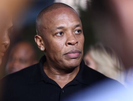 In this Aug. 10, 2015, file photo, Dr. Dre arrives at the Los Angeles premiere of "Straight...