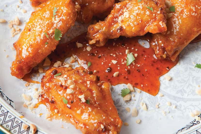 San Antonio’s Hot Joy  serves   Crab Fat Wings with a caramel-tinged fish sauce.