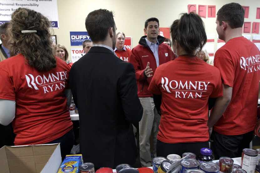 Republican vice presidential candidate, Rep. Paul Ryan, R-Wis., speaks to volunteers and...