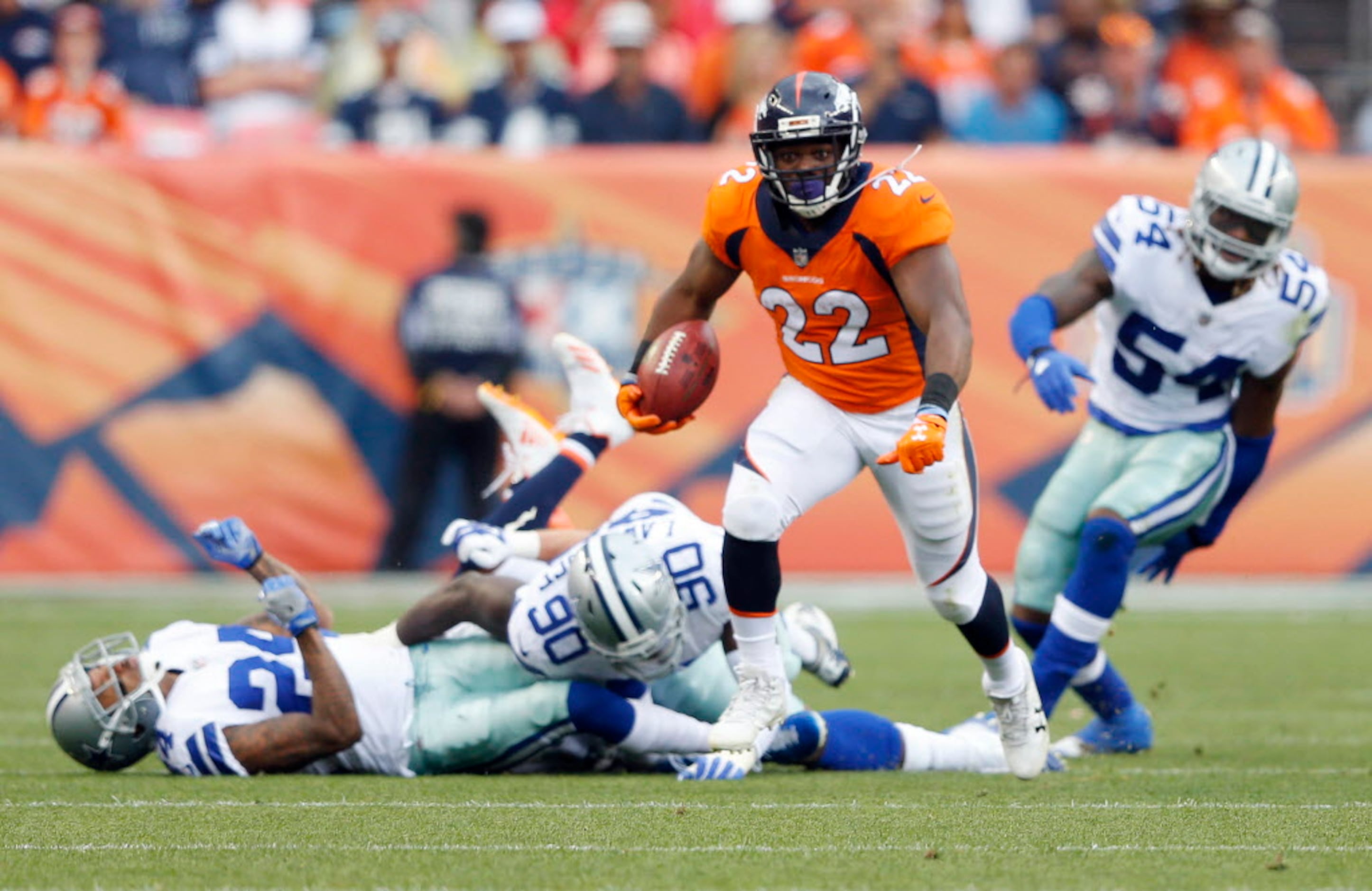 Running back C.J. Anderson (22) carries the ball during the NFL Super Bowl  50 – Denver Broncos History