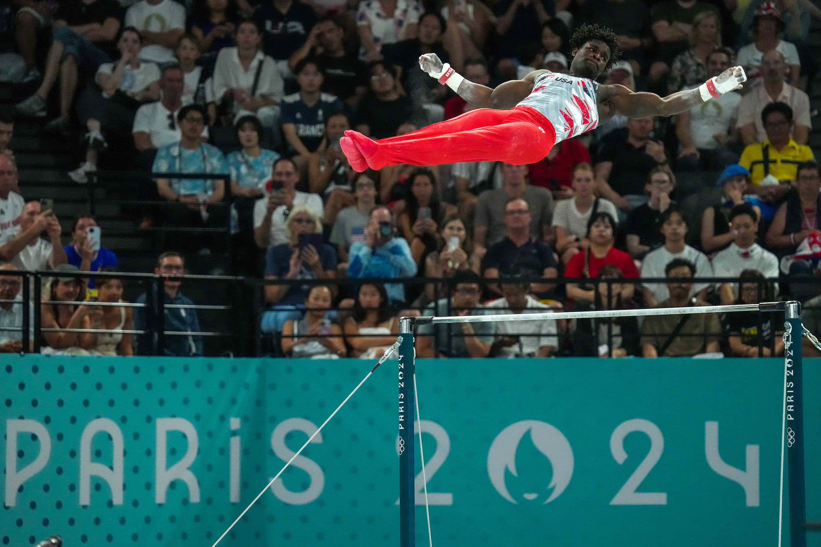 Frederick Richard  of the United States competes on the high bar during the men’s gymnastics...