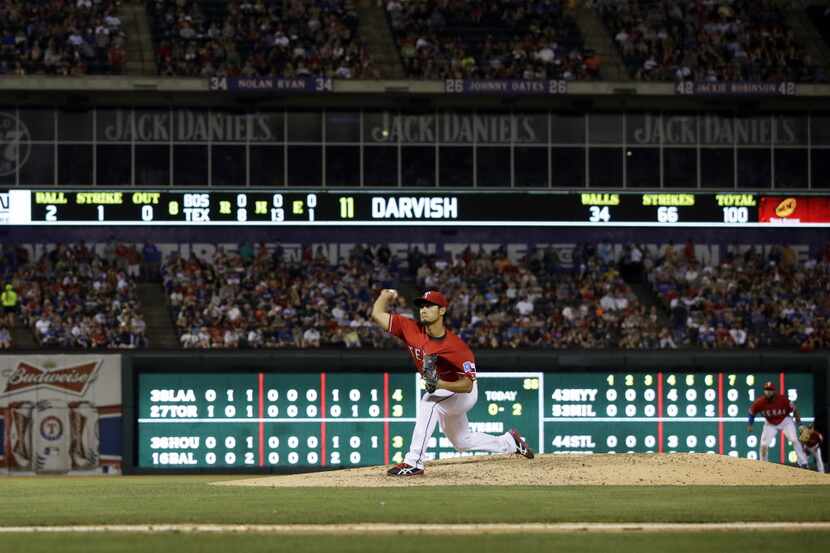Texas Rangers' Yu Darvish of Japan throws his 111th pitch to the Boston Red Sox in the...