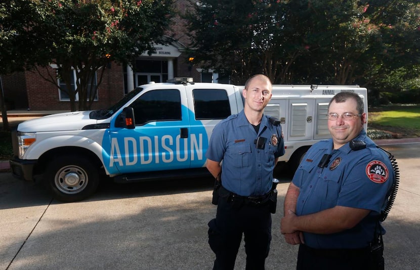 
Addison Animal Control Officers, Ryan Wies (left) and Kevin Kimbrell, pictured in front of...