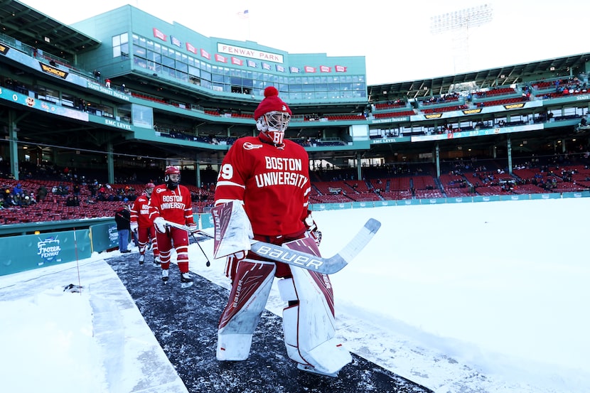 BOSTON, MA - JANUARY 8: Jake Oettinger #29 of the Boston University Terriers leads his team...