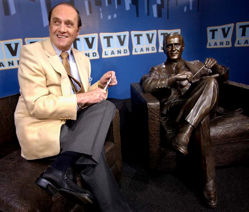 FILE - Actor-comedian Bob Newhart sits with a bronze likeness of Dr. Bob Hartley, the...