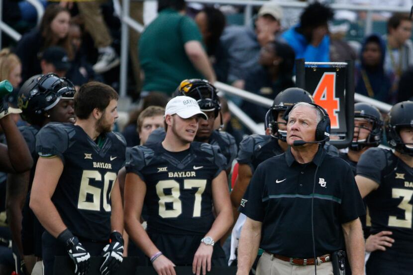 Baylor Bears head coach Jim Grobe looks at a replay during their game against the TCU Horned...