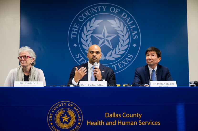 Congressman Colin Allred (TX-32, center) joins Dr. Trish M. Perl (left), the Chief of the...