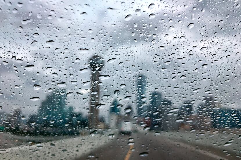 Waves of rain passed over downtown Dallas in October.