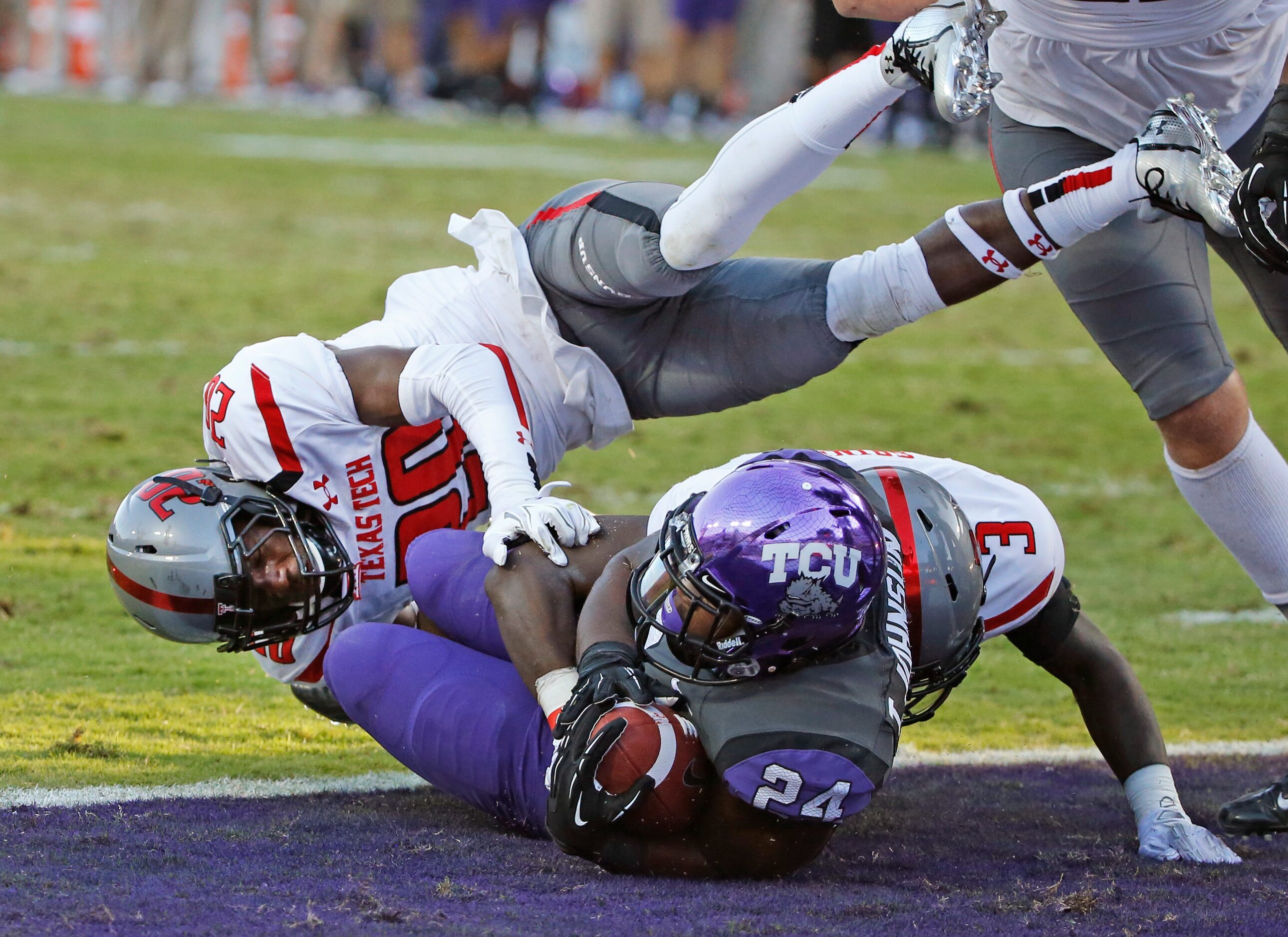 TCU running back Trevorris Johnson (24) scores on a fourth quarter run as Texas Tech...