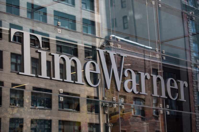FILE - OCTOBER 22, 2016: It was reported that AT&T has reached a deal to acquire Time Warner...