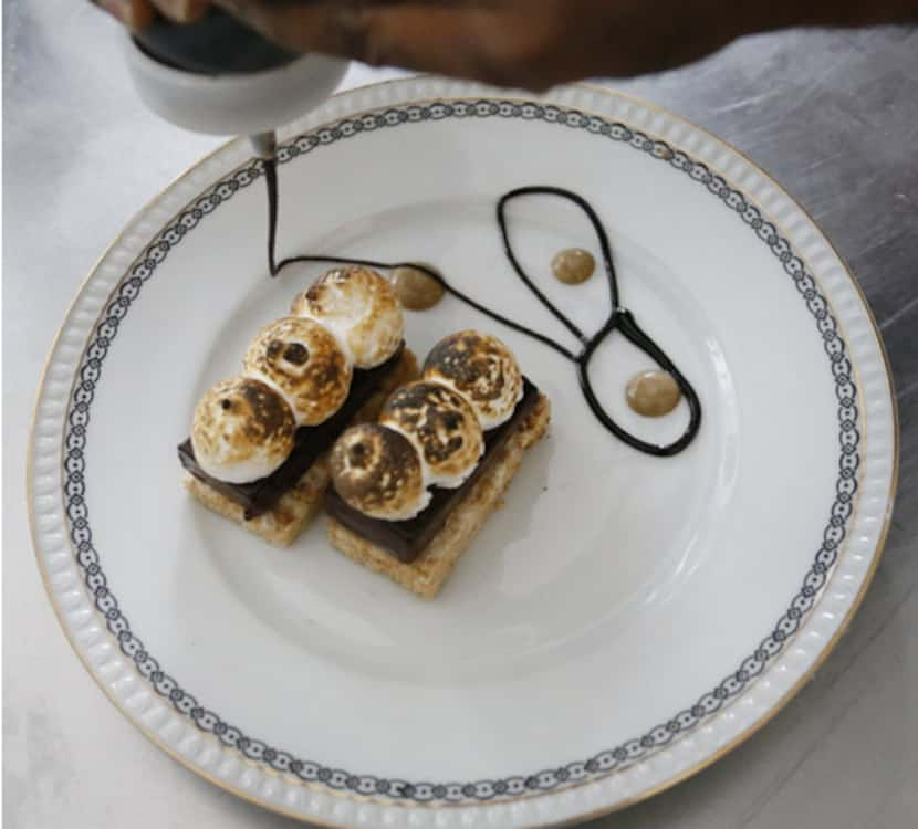 Pastry intern Salifu Mansaray prepares S'more at Cafe Momentum during his evening shift.