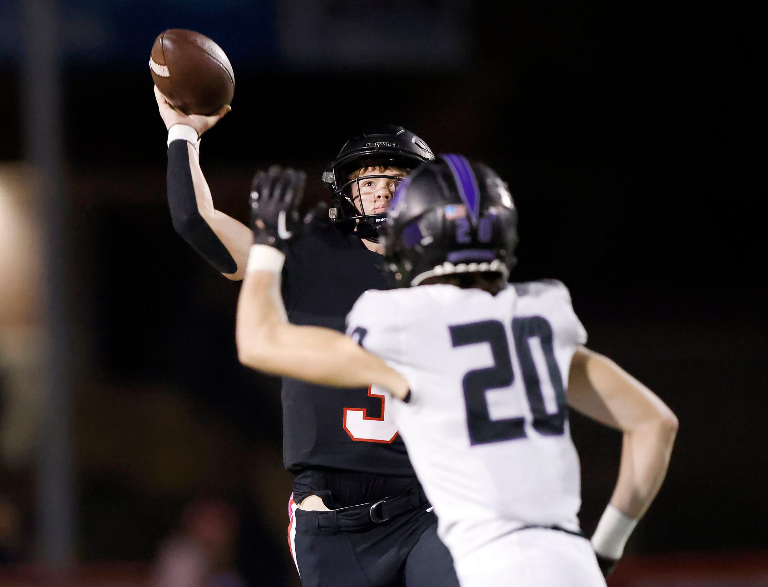 Argyle quarterback Jacob Robinson (3) throws a long pass over the head of Frisco...