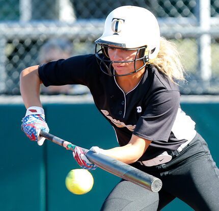 FILE - The Colony shortstop Jayda Coleman (10) bunts safely in the fourth inning of a...