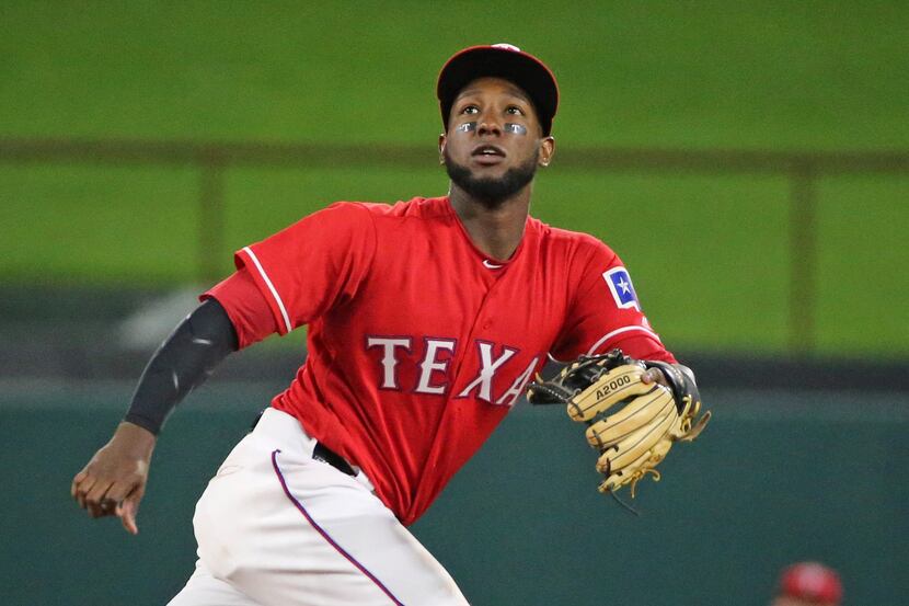 Texas Rangers second baseman Jurickson Profar (19) is on the move on a batted ball in the...
