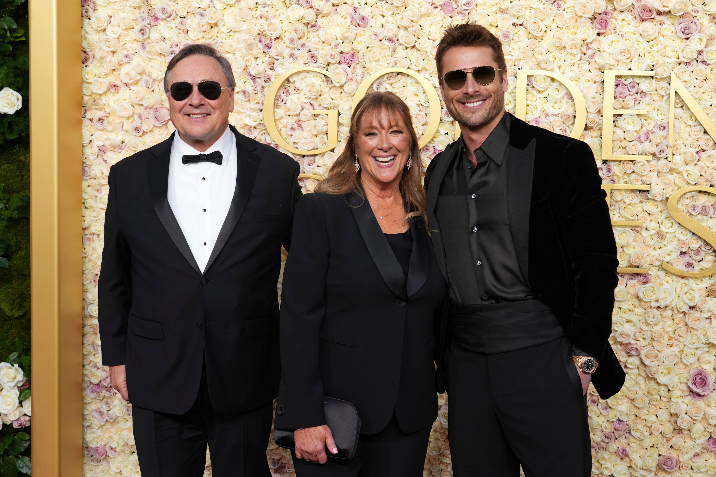 Glen Powell Sr., from left, Cyndy Powell, and Glen Powell arrive at the 82nd Golden Globes...