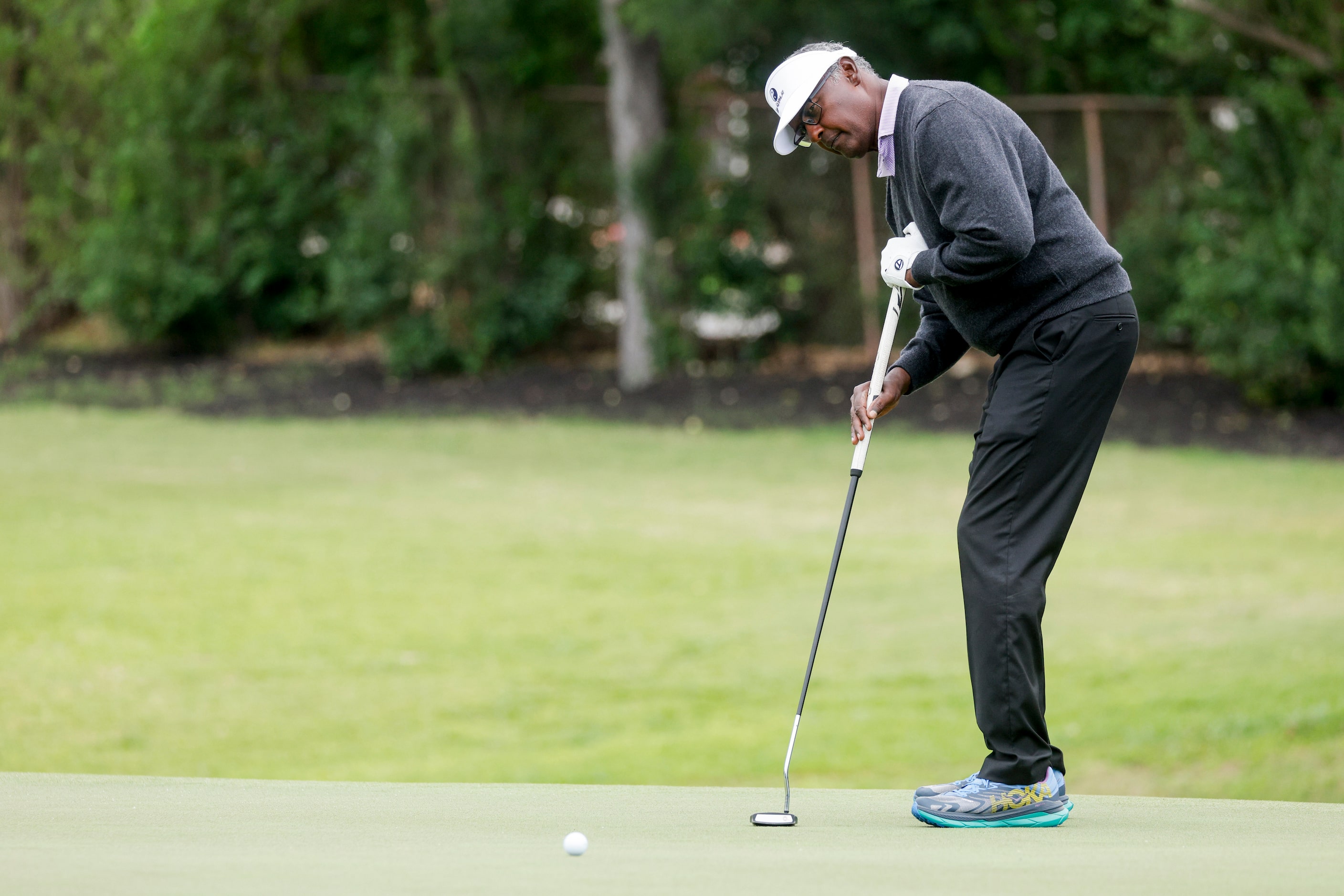 Vijay Singh puts on the 17th green during the first round of the Invited Celebrity Classic...