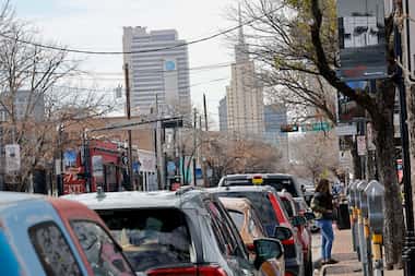 Parking meters line up in Dallas' Deep Ellum District in February 2024.