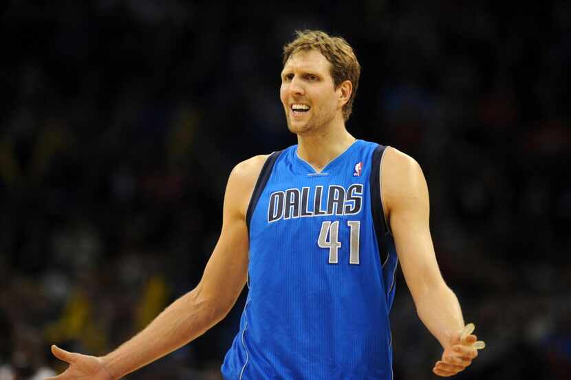 Mar 16, 2014; Oklahoma City, OK, USA; Dallas Mavericks forward Dirk Nowitzki (41) reacts to...