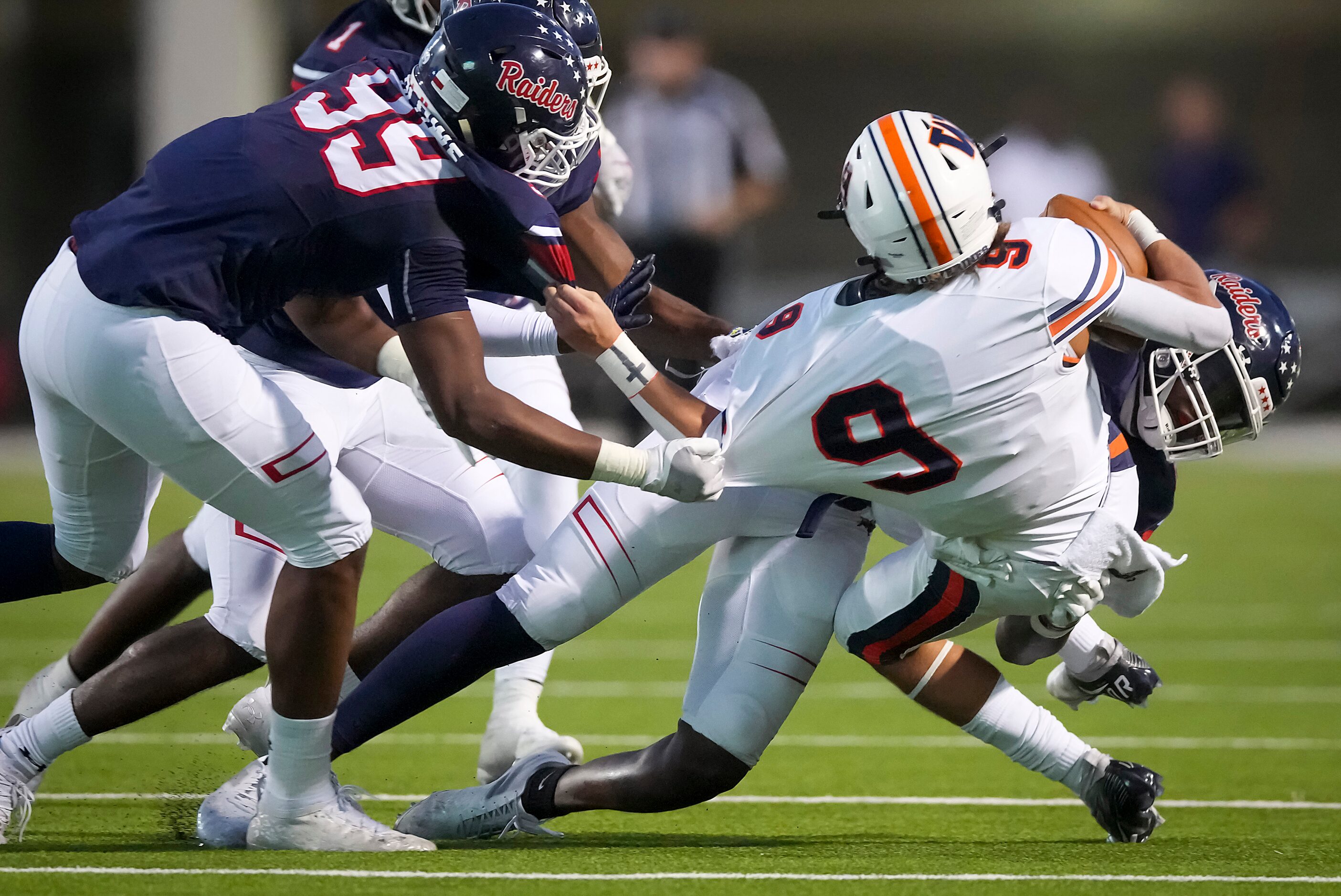 Frisco Wakeland quarterback Brennan Myer (9) is sacked by Denton Ryan defensive tackle...