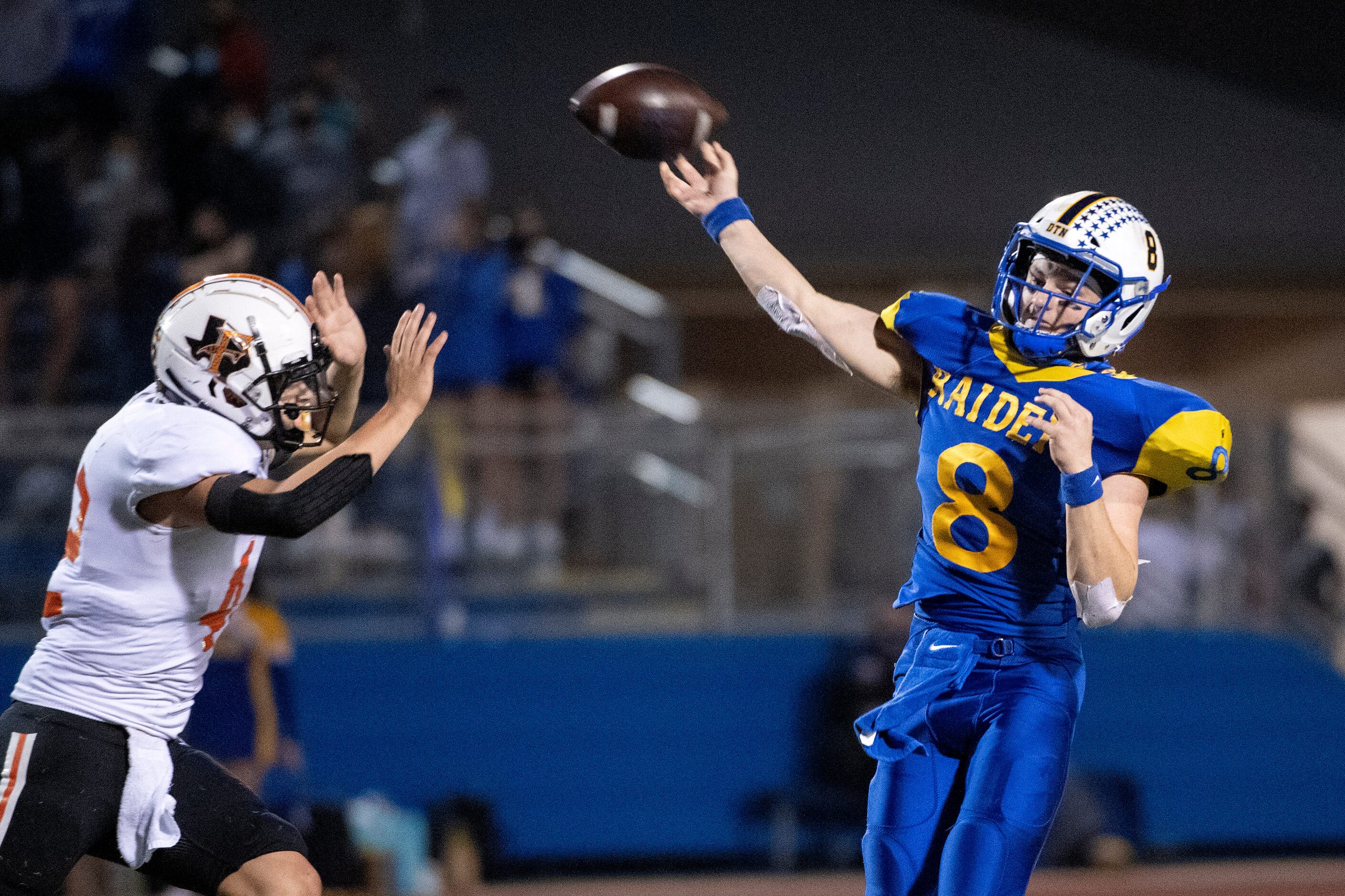 Sunnyvale junior quarterback Max McAda (8) flings a pass over Ferris senior linebacker Alan...