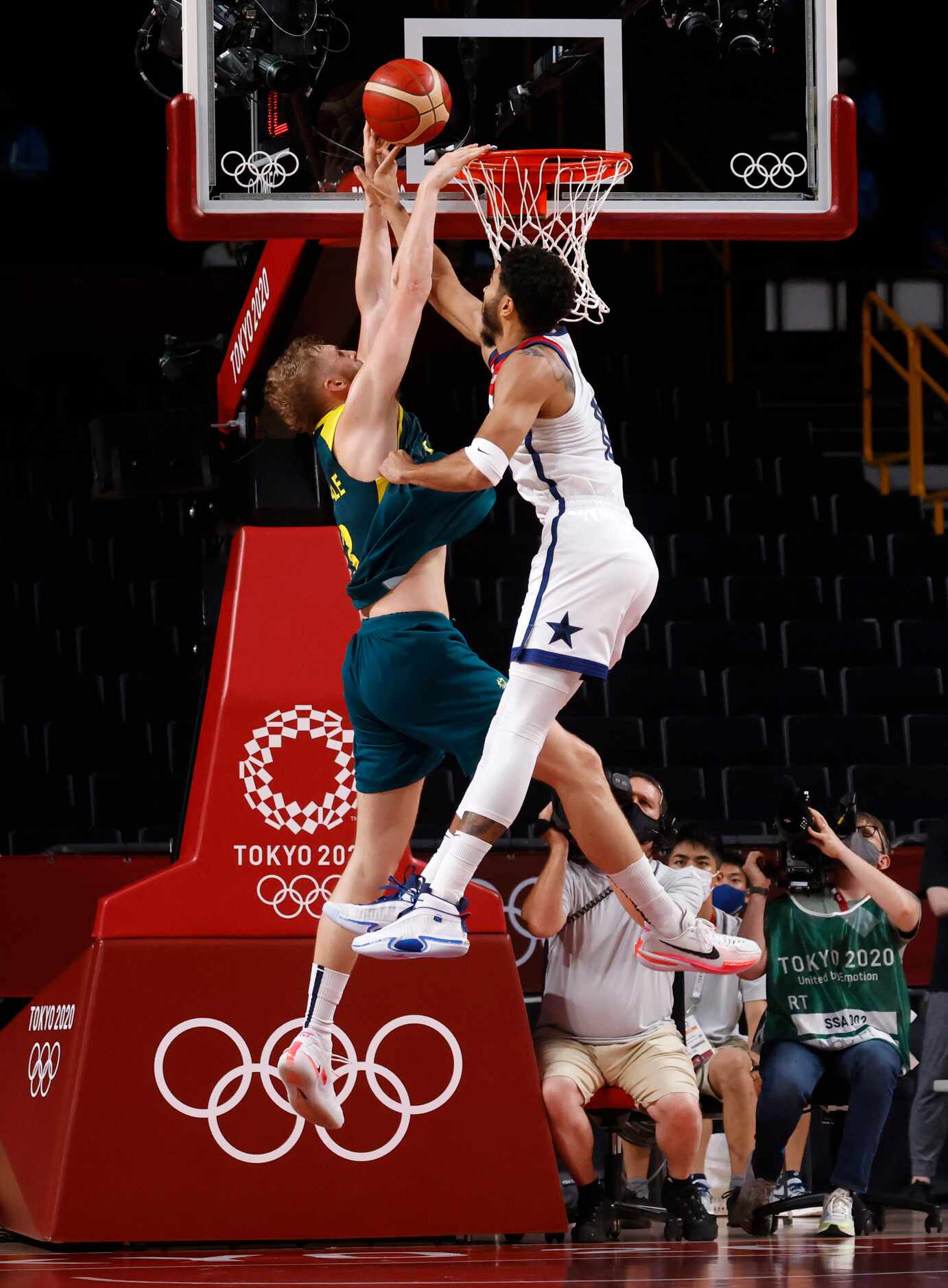 USA’s Jayson Tatum (10) gets his hand on a shot by Australia’s Jock Landale (13) during the...