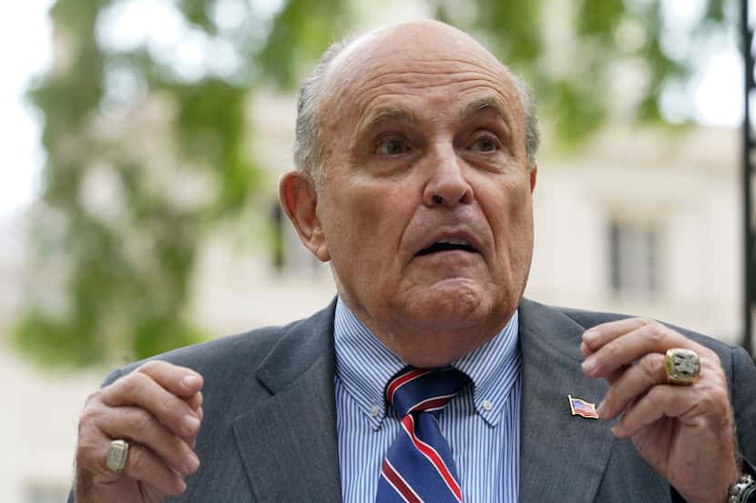 FILE - Former New York City mayor Rudy Giuliani speaks during a news conference on  June 7,...