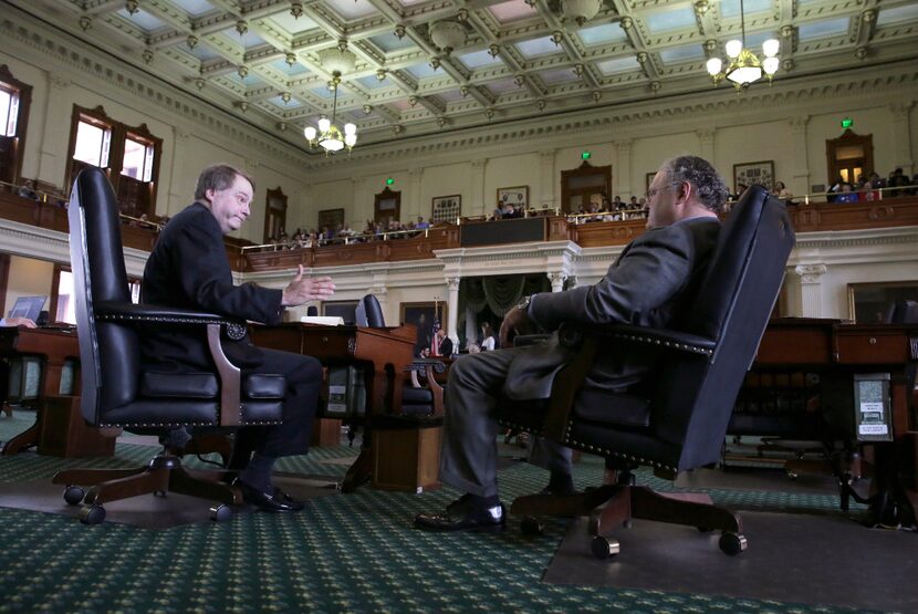 Sen. Brian Birdwell, R-Granbury (left) visits with Sen. Craig Estes, R-Wichita Falls, in the...