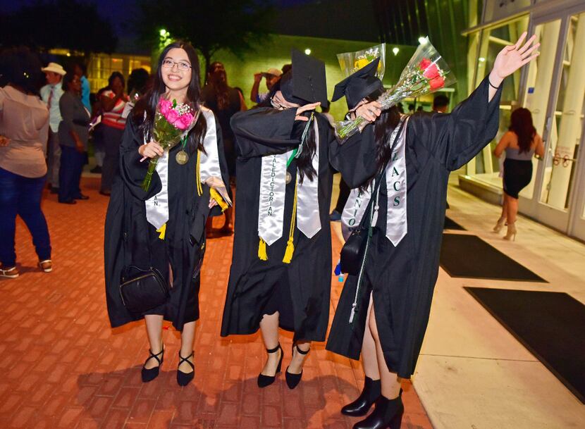 Triplet sisters, salutatorian Han Bao Tran (left), valedictorian Tran Bao Tran and No....