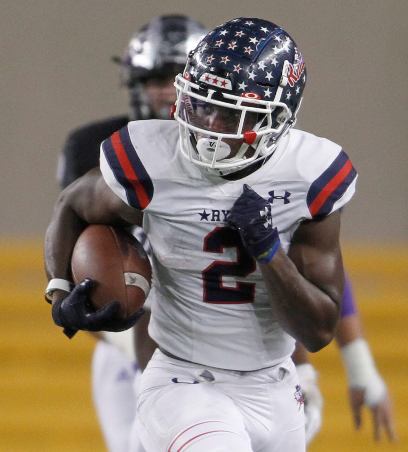 Denton Ryan running back Kalib Hicks (2) sprints through the College Station secondary for a...