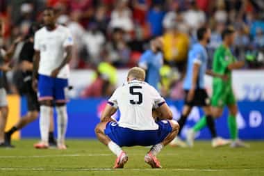 Antonee Robinson of the United States reacts after losing 0-1 against Uruguay at the end of...
