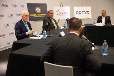 U.S. Senator John Cornyn listens during a roundtable discussing the semiconductor shortages...