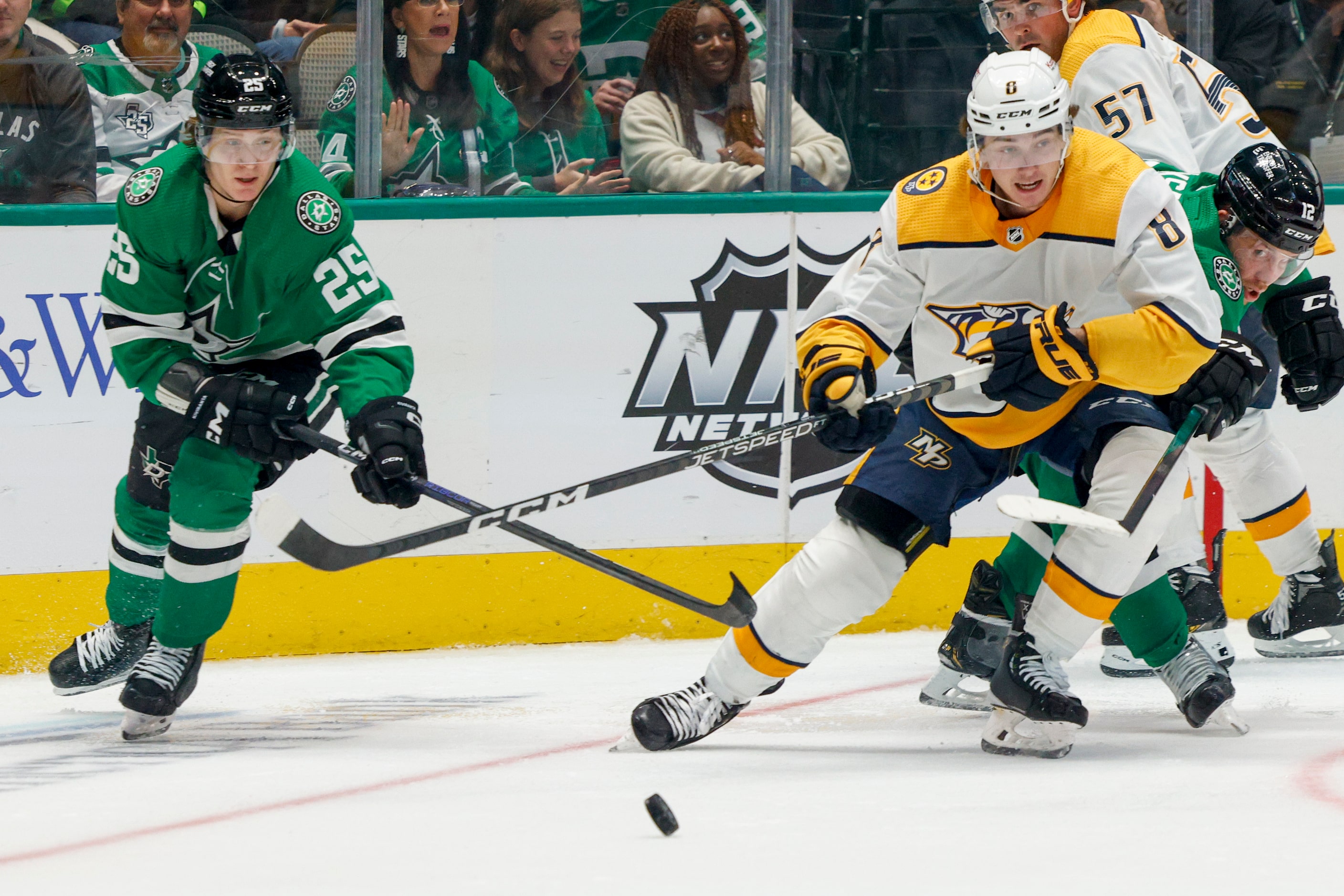 Dallas Stars left wing Joel Kiviranta (25) and Nashville Predators center Cody Glass (8)...