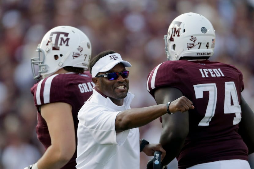 Texas A&M head coach Kevin Sumlin celebrates after a touchdown against Alabama during the...