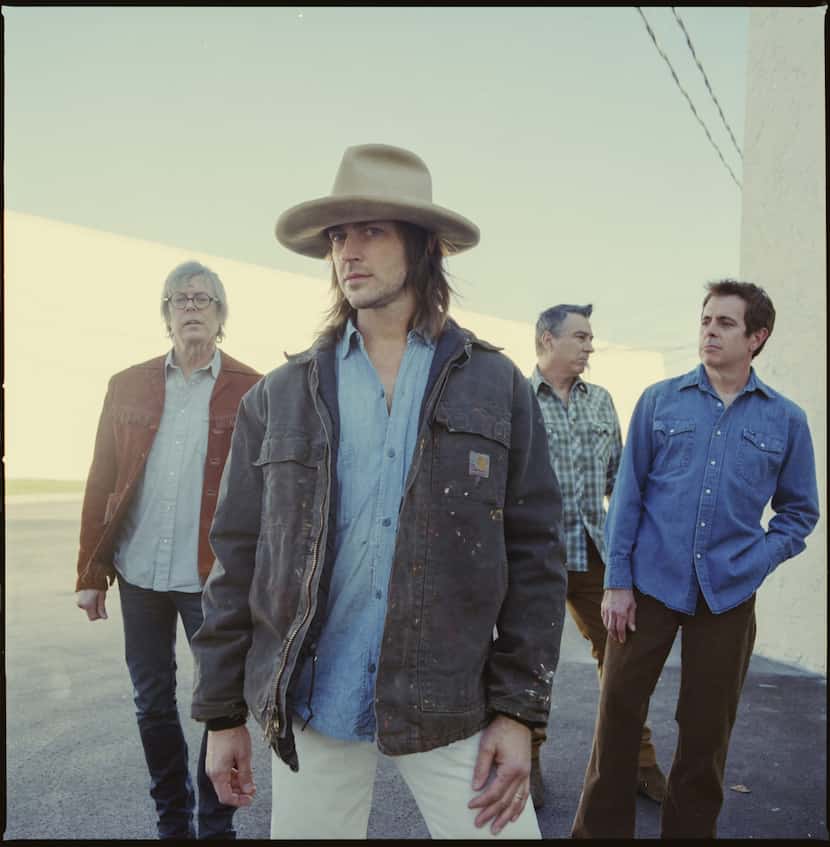 Rhett Miller, front, and members of Old 97's pose for a publicity photo. The 97′s announced...