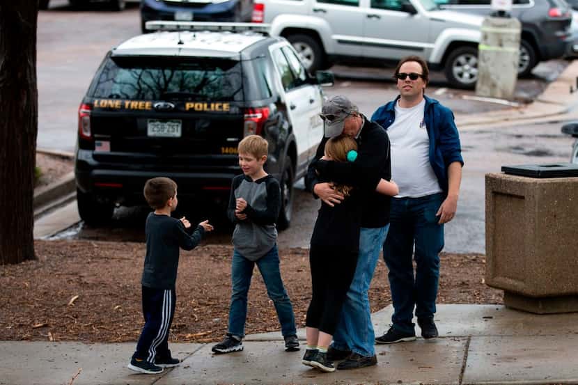 Students are evacuated from the Recreation Center at Northridge in Highlands Ranch after a...