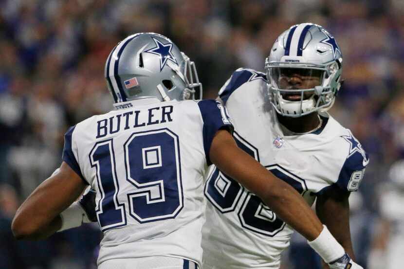Dallas Cowboys wide receiver Dez Bryant (88, with Brice Butler (19)) stares down defender...