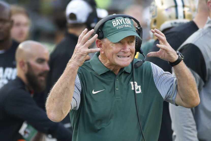 Baylor acting head coach Jim Grobe reacts along the sideline during the first quarter of the...