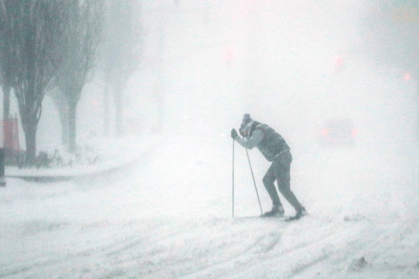  A man skis on a snow covered street in Manhattan in New York on January 23, 2016. (KENA...