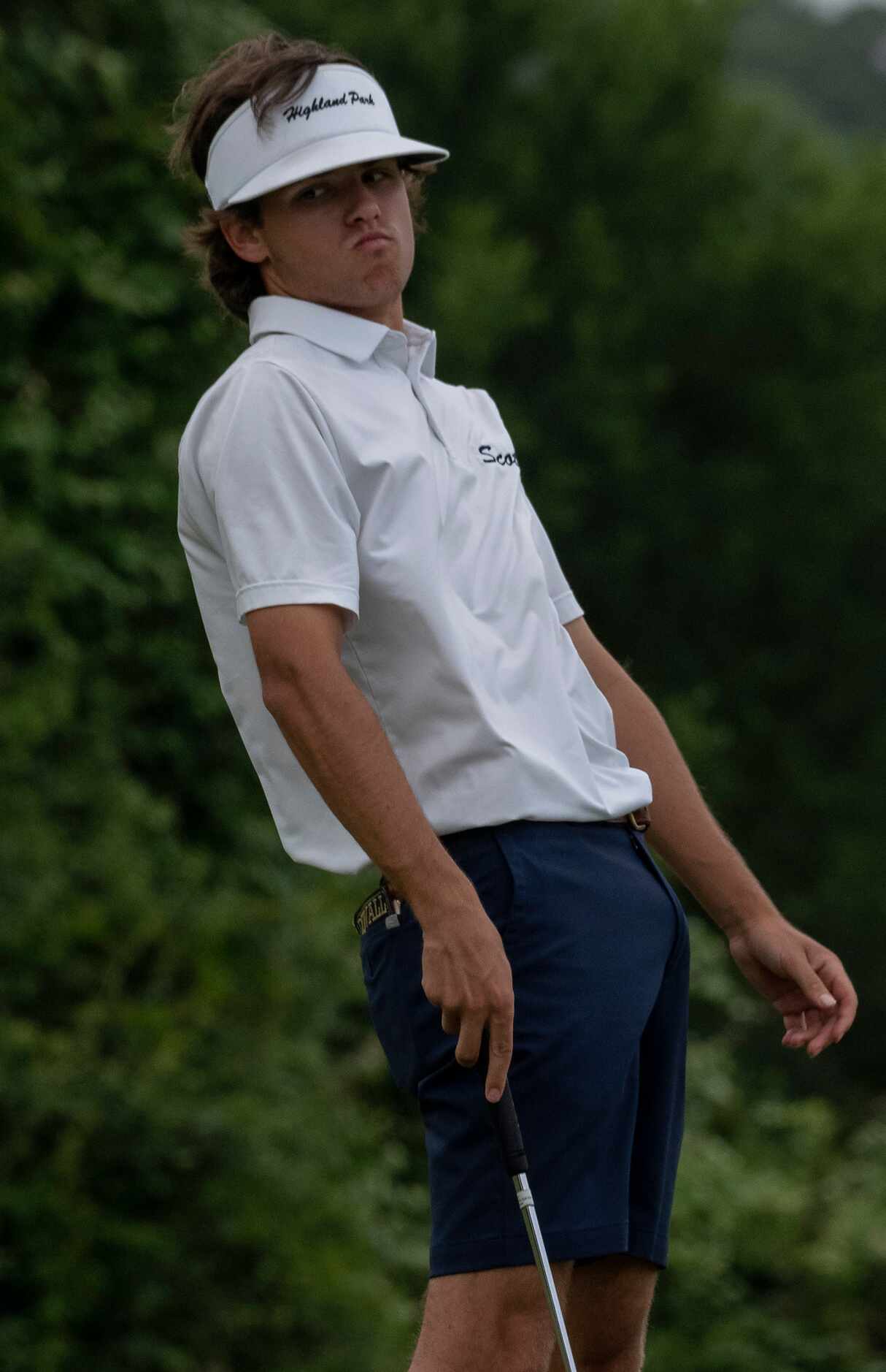 Highland Park gold, Mack Duvall, reacts to missing a birdie putt on the no. 1 green  during...