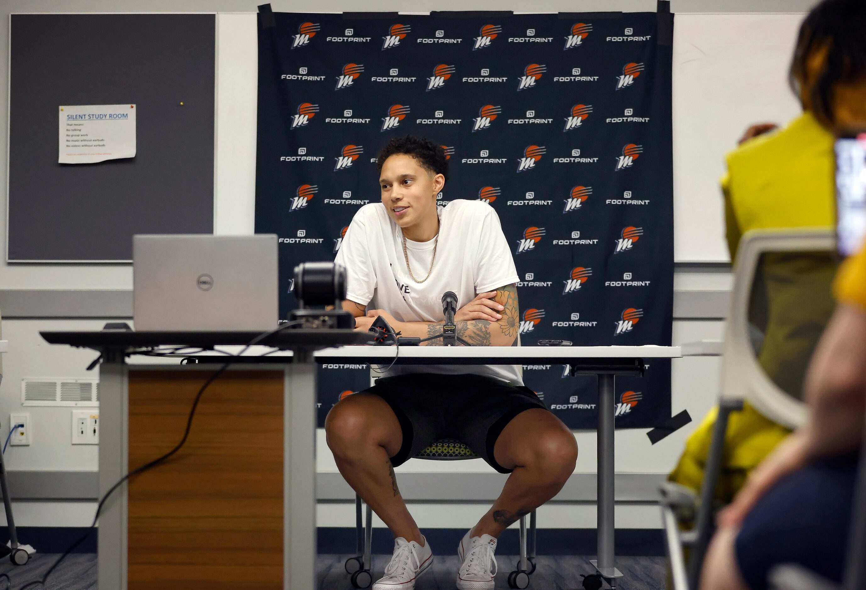 Phoenix Mercury center Brittney Griner (42) answers questions from the media following her...