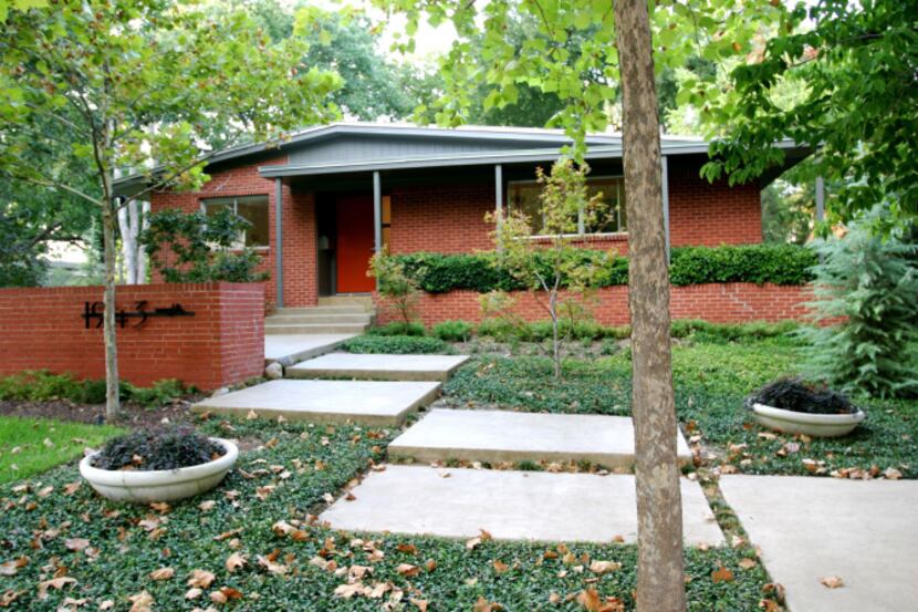 The Lenox-Taylor residence is a typical brick, ranch-style house in the Stevens Park...