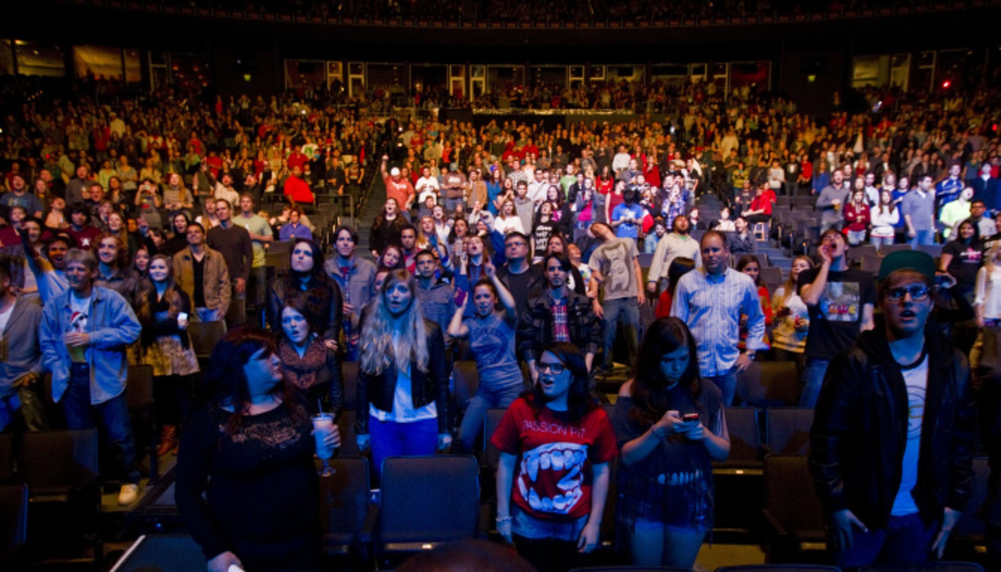 Fans look on as Passion Pit performs during the "How the Edge Stole Christmas" show at...