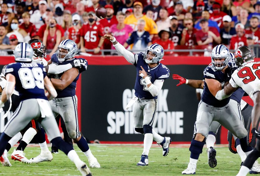 Dallas Cowboys quarterback Dak Prescott (4) throws a deep third quarter pass to wide...